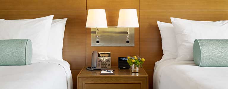 queen beds in hotel room at ucla luskin conference center and hotel