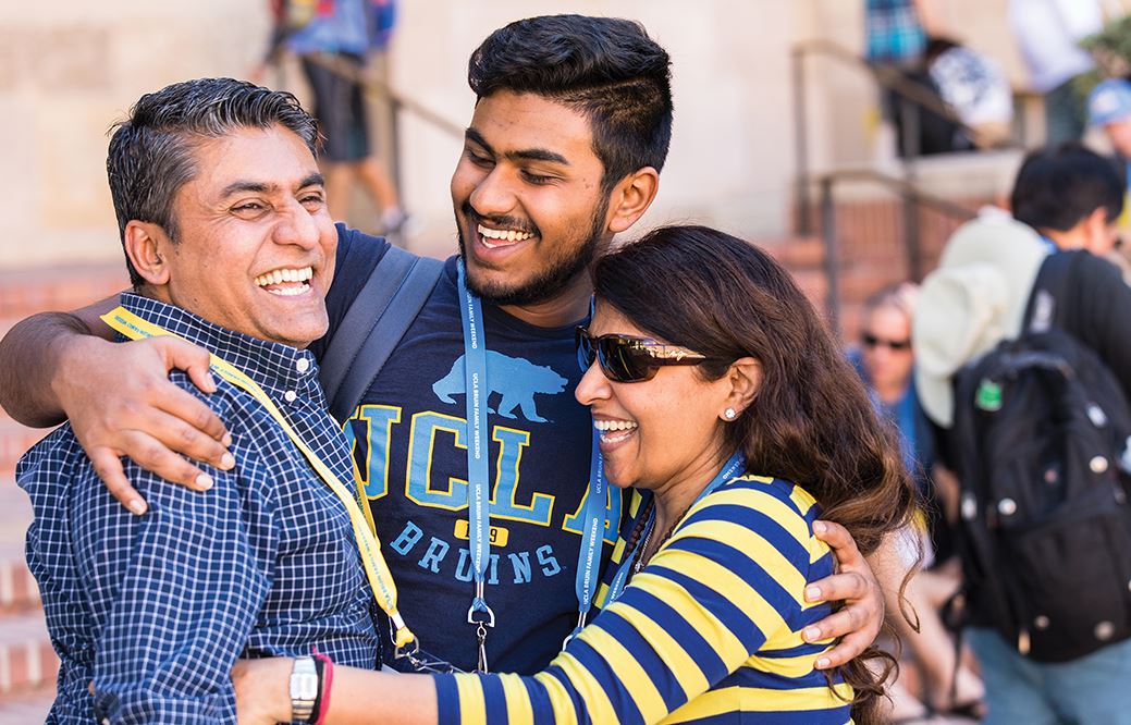 A UCLA student with his parents